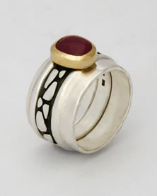 Three band 'Stacking Ring' with oxidized silver middle band, Ruby set on middle band.